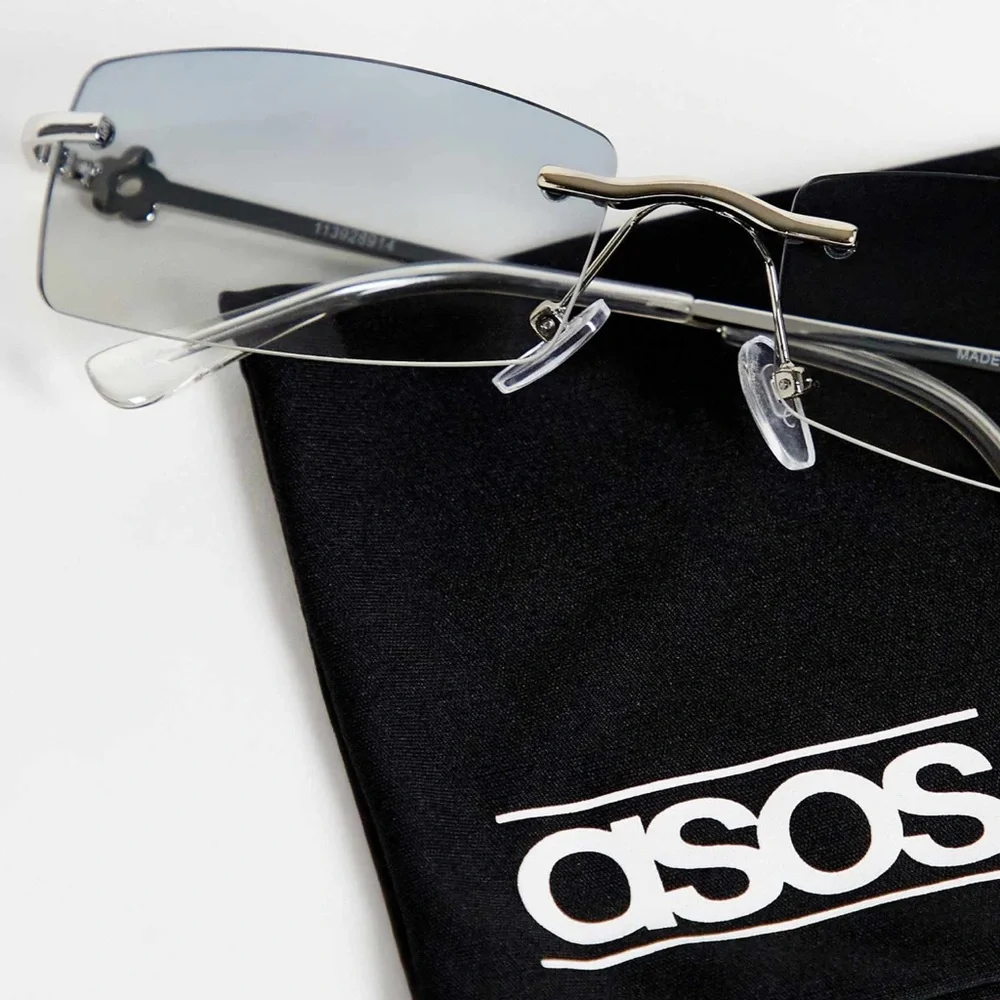 ASOS DESIGN rimless 90s sunglasses in smoke lens with 90s temple detail